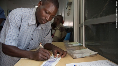 A customer at a Barclays bank in Uganda