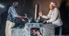 Paulina Sibanda and her husband Opheus Dube cook together in their kitchen in Zvishevane region, Zimbabwe