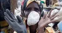 A woman in Kenya working on a plastics recycling initiative