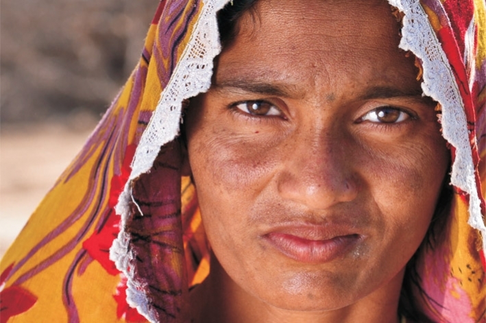 A Pakistani woman. © CARE
