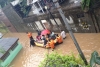 A rescue during flooding in Indonesia in January 2013. © CARE / Paul Dixon