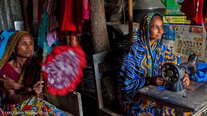 Asiya (right) has revived her dressmaking business thanks to a loan from her village savings group (Bangladesh, 2013)