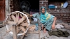 Allah Rakhi, a seamstress from Pakistan and recipient of a Lendwithcare loan